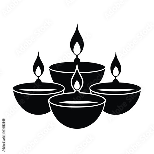 classic-indian-festival-diya-lamp-silhouettes--bla.eps