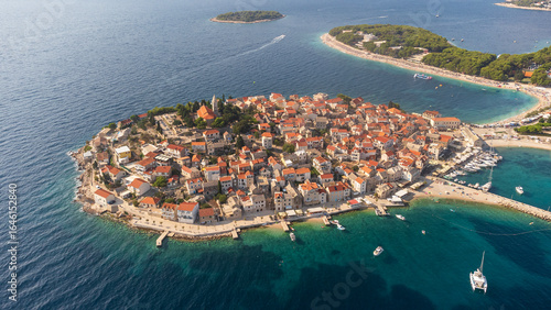 Aerial panorama of the tourist town of Primosten in Croatia. Aerial view of the landscape with the village and the Croatian Adriatic coast in summer