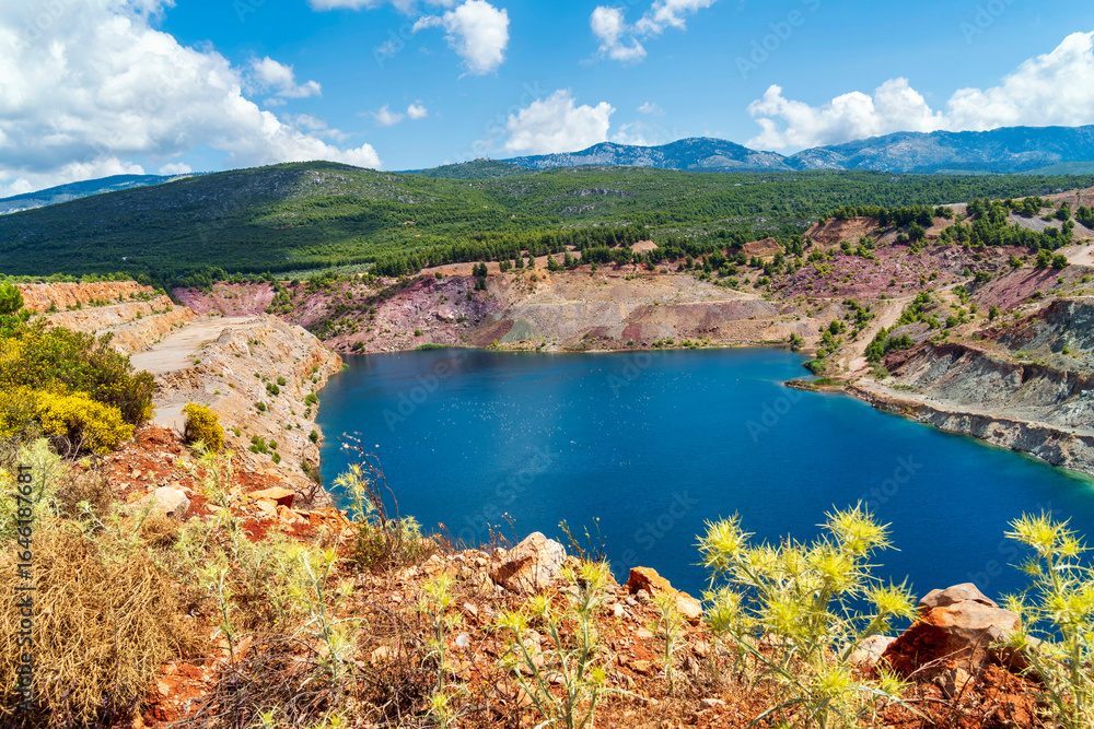 Obraz premium Turquoise Waters of Triadas Lake in Larko Mining Site Evia