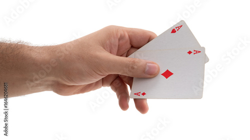 Fotografie Card game with two aces held in hand showcasing a winning hand in a competitive