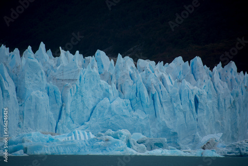 Картината върху платно Perito Moreno glacier in Patagonia Argentina is very large and even in the rain the blue ice colors are impressive and the ever present calving of the ice lets you feel the power of the glacier