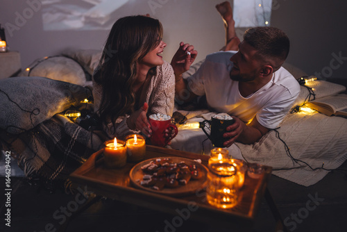 Εκτύπωση καμβά Cozy romantic evening, home weekend In bed for a loving couple