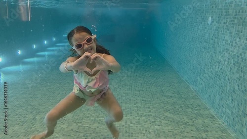  swimming in a pool - hotel concept