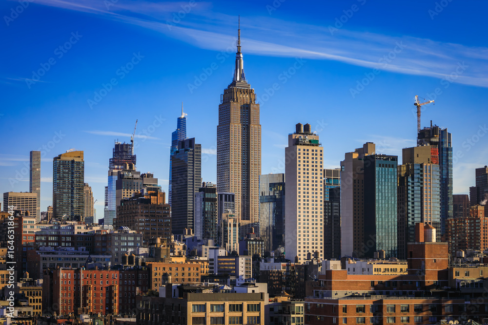 Fototapeta premium Midtown Manhattan skyline with modern skyscrapers on a clear day, New York, USA