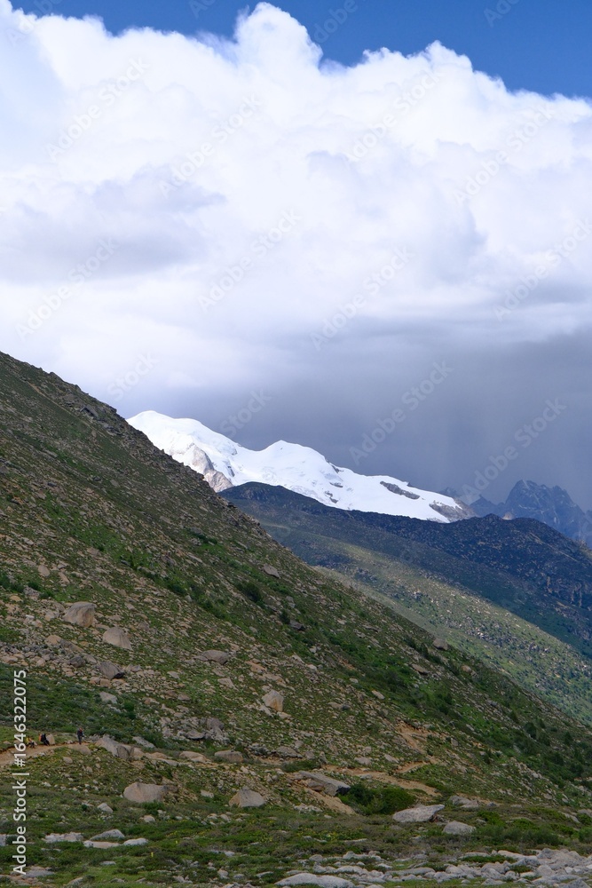 Fototapeta premium Scenic mountain landscape with snow-capped peaks.