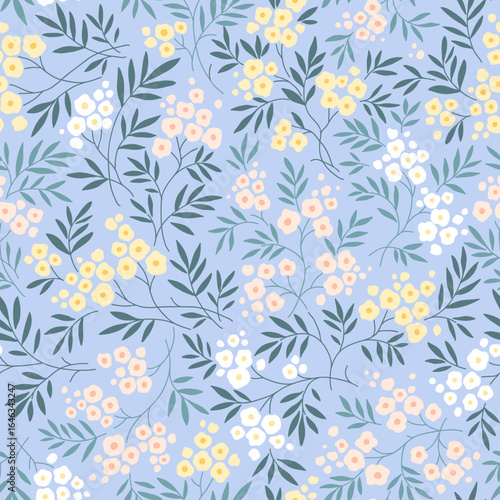 Cute Easter floral pattern. Pretty flowers on blue background. Printing with small yellow, white and pink flowers. Ditsy print. Seamless vector texture. Spring bouquet. Vintage template prints. Stock
