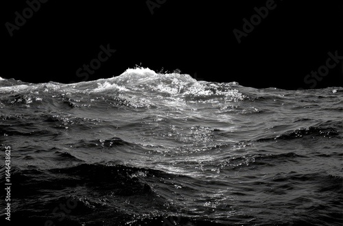 Gray-scale ocean waves against black