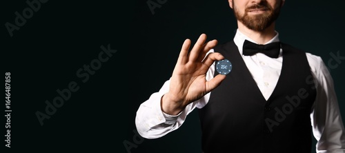 Handsome male poker player ...