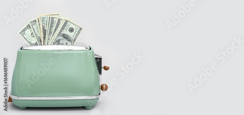 Toaster with dollar banknot...