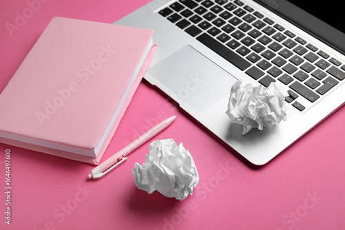 Blank book, pen, crumpled p...