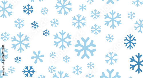 Delicate winter themed pattern with light blue snowflakes scattered