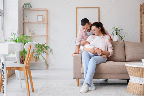 Happy parents with their li...