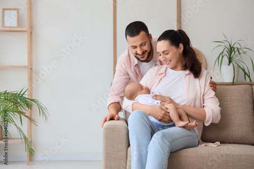 Happy parents with their li...