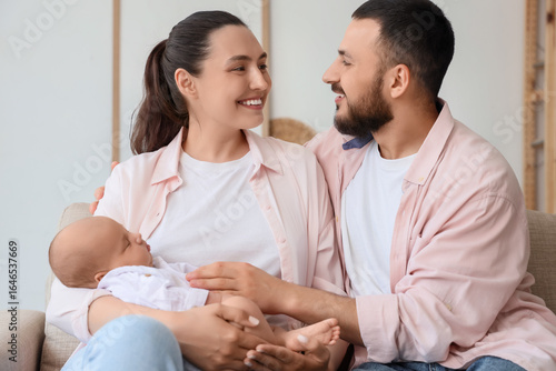 Happy parents with their li...
