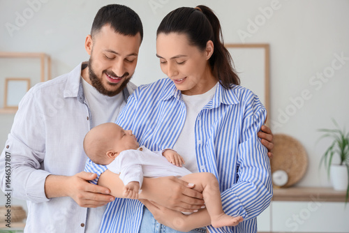 Happy parents with their li...