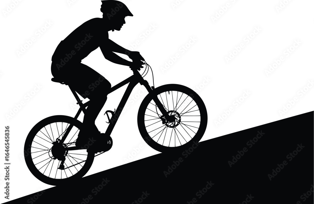 Obraz premium Silhouette of a mountain biker riding uphill, showcasing thrill of extreme sports and beauty of nature