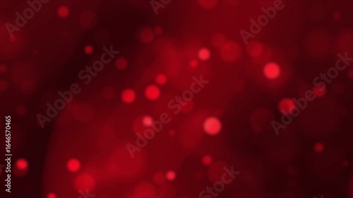 Blurred red background with festive bokeh lights. Suitable for holidaythemed designs, christmas cards, party invitations, and seasonal marketing campaigns.