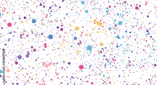 Splattered paint creates a lively colorful texture on a white background
