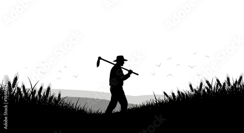 silhouette of a farmer walking through wheat field hard work rural life and agricultural success