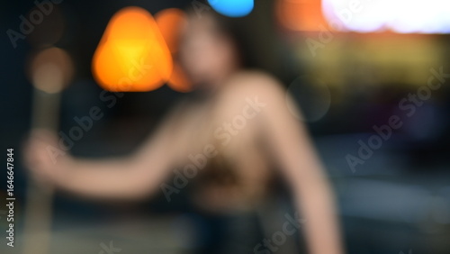 Defocused Artistic Photo with Orange and Blue Neon Bokeh