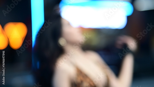 Defocused Artistic Photo with Orange and Blue Neon Bokeh
