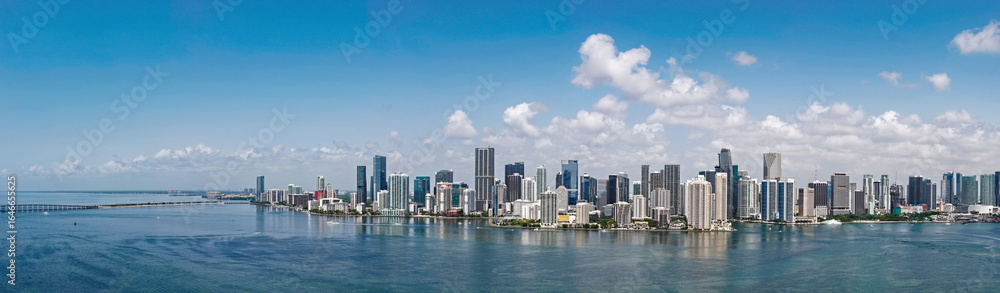 Aerial panorama of Brickell in Miami. Downtown Miami skyline on a sunny day. Scenic view of Miami Beach and Brickell. Brickell famous landmarks. Miami downtown landscape. Aerial panorama of Brickell in Miami. Downtown Miami skyline on a sunny day. Scenic view of Miami Beach and Brickell. Brickell famous landmarks. Miami downtown landscape.