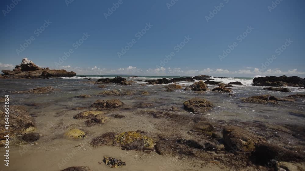 low tide rising on shallow rocks low tide rising on shallow rocks