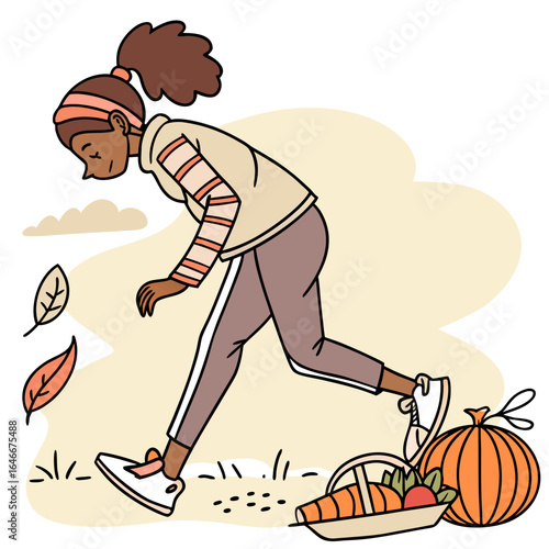 A woman in athletic wear enjoys a brisk autumn walk collecting fresh produce and appreciating the fall season s bounty