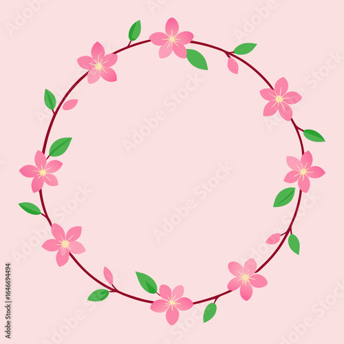 Pink cherry blossom wreath with green leaves on pastel background