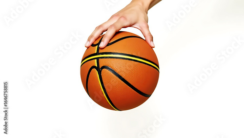 Hand holding orange basketball on white background