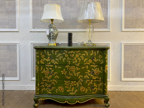 Tableau sur toile Vintage old credenza with classic lamp and wall mouldings