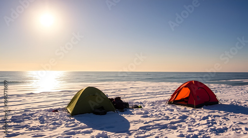 Winter fishing at sea. Tents, snow, sea.