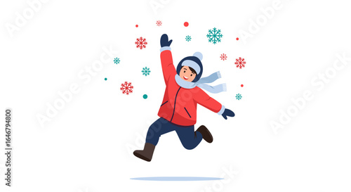 Young child excitedly playing in falling snowflakes outdoors enjoying winter season activities