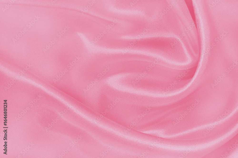 Fototapeta premium Soft pink fabric texture background, detail of silk or linen pattern.