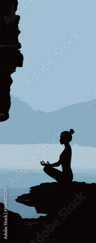 A woman is sitting on a rock by a body of water. She is meditating. The water is calm and the sky is blue