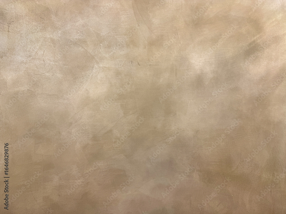 Obraz premium Decorative metallic gold paint on a surface. Random limestone golden washed paint with grunge, and dirt pattern. Seamless background texture.