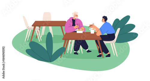 Men eating out, sitting at outdoor table with street fast food. People with l...