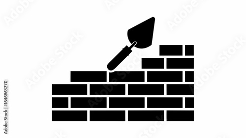 Illustration of a brick wall under construction with a trowel laying the mortar on top of the structure