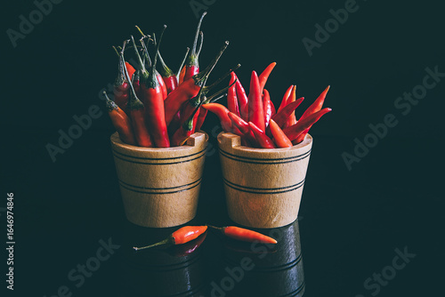 Tabasco chilies on a metal tray background