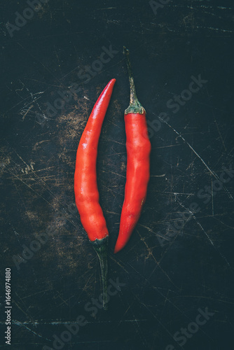 Tabasco chilies on a metal tray background
