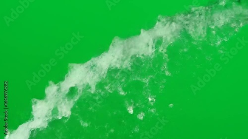 Splashing Water Moving Rapidly Across Green Screen Background in Slow Motion