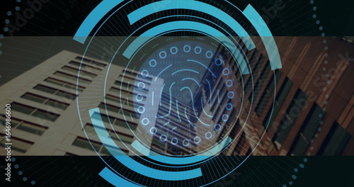 Wallpaper Mural Projecting fingerprint interface displaying concentric rings and binary code amid highrise facades Torontodigital.ca
