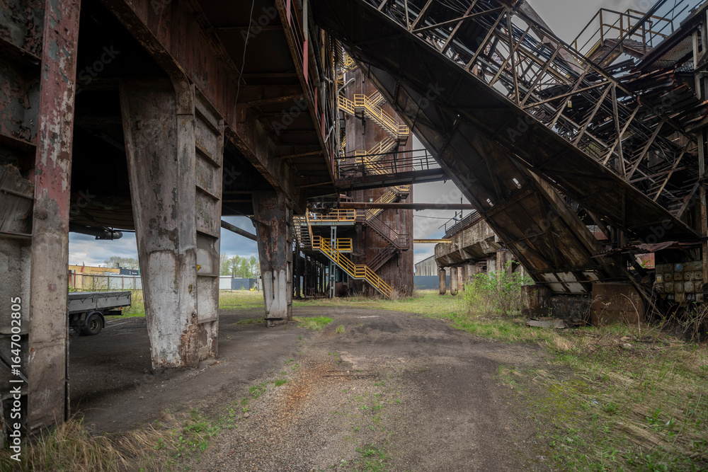 Abandoned Heavy Industrial Ruins with Large Blast Furnace in Steelworks Abandoned Heavy Industrial Ruins with Large Blast Furnace in Steelworks