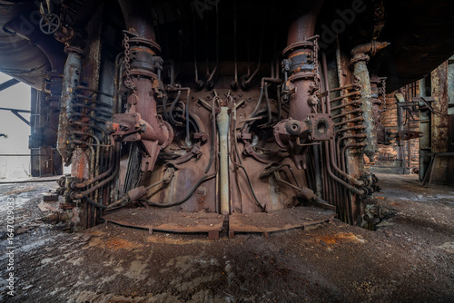Abandoned Heavy Industrial Ruins with Large Blast Furnace in Steelworks