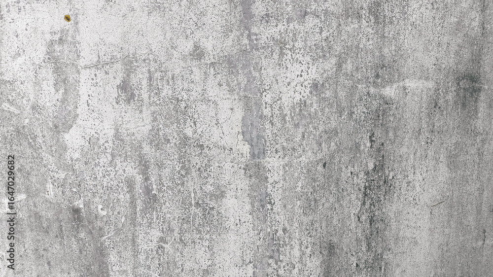 Obraz premium Grunge background of weathered horizontal wall with cracks and stains, ideal for digital textures, restoration themes, and architectural visuals.