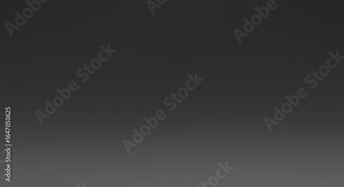 Abstract Dark Gray Gradient Background with Subtle Texture.