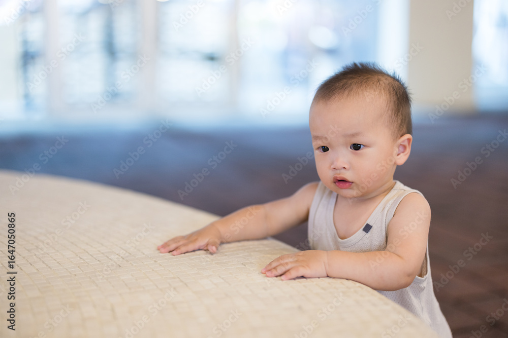 Baby enjoying outdoor walk in city street