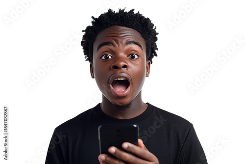 Shocked Black man in T-shirt holds phone on transparent background for posters, social media, branding.