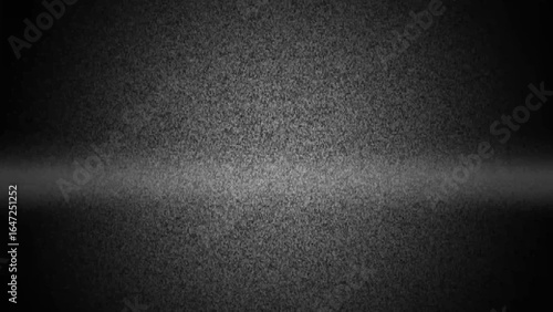 Dark Textured Surface with a Faint Horizontal Light Streak and Vignette background grain