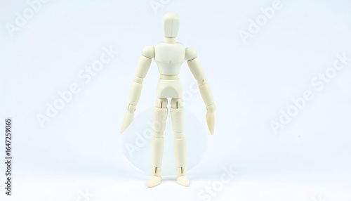 Simple wooden art mannequin, a versatile poseable figure for creative visualization and design.